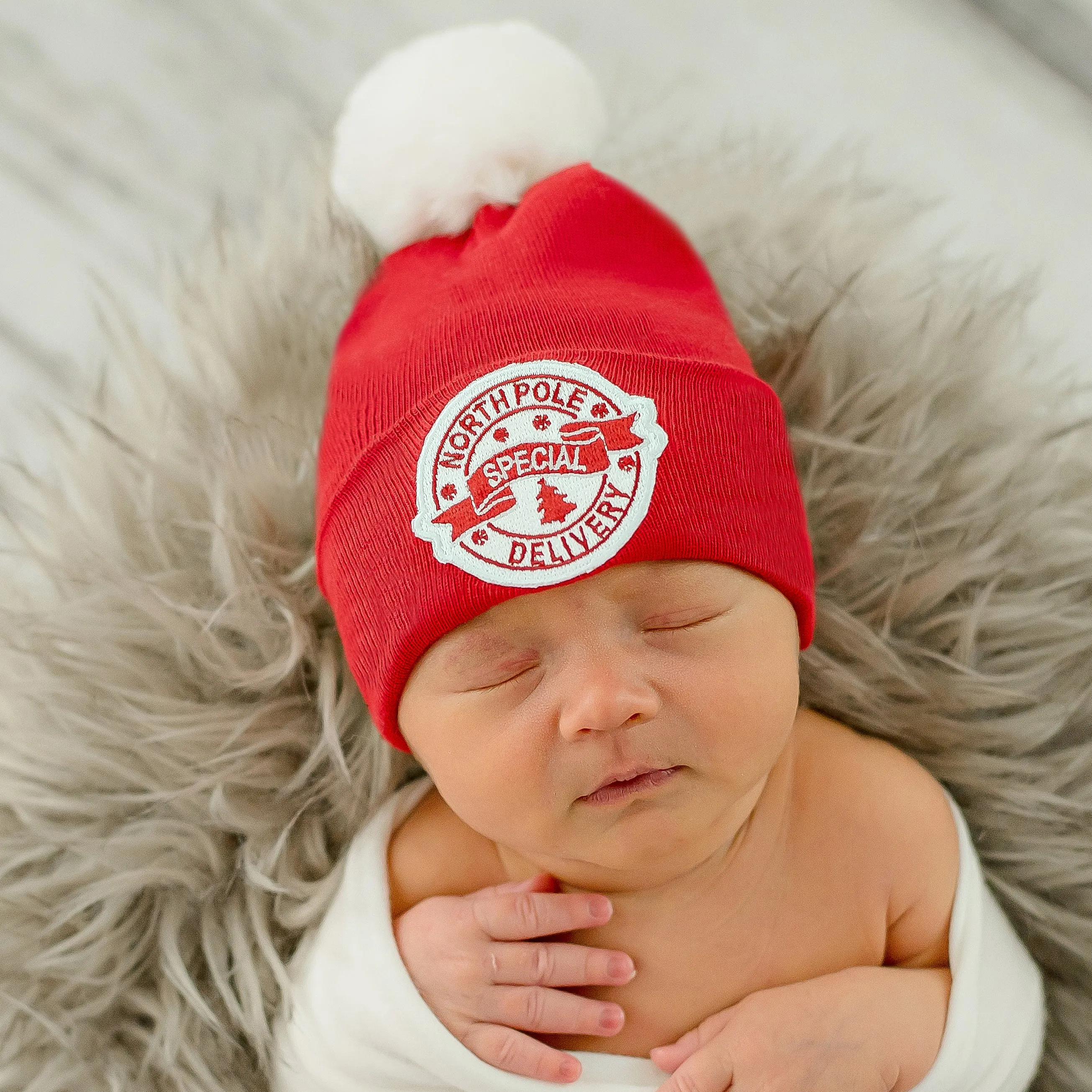 Red or White North Pole Special Delivery with White Fuzzy Pom Pom - Gender Neutral Christmas Hat for Newborns