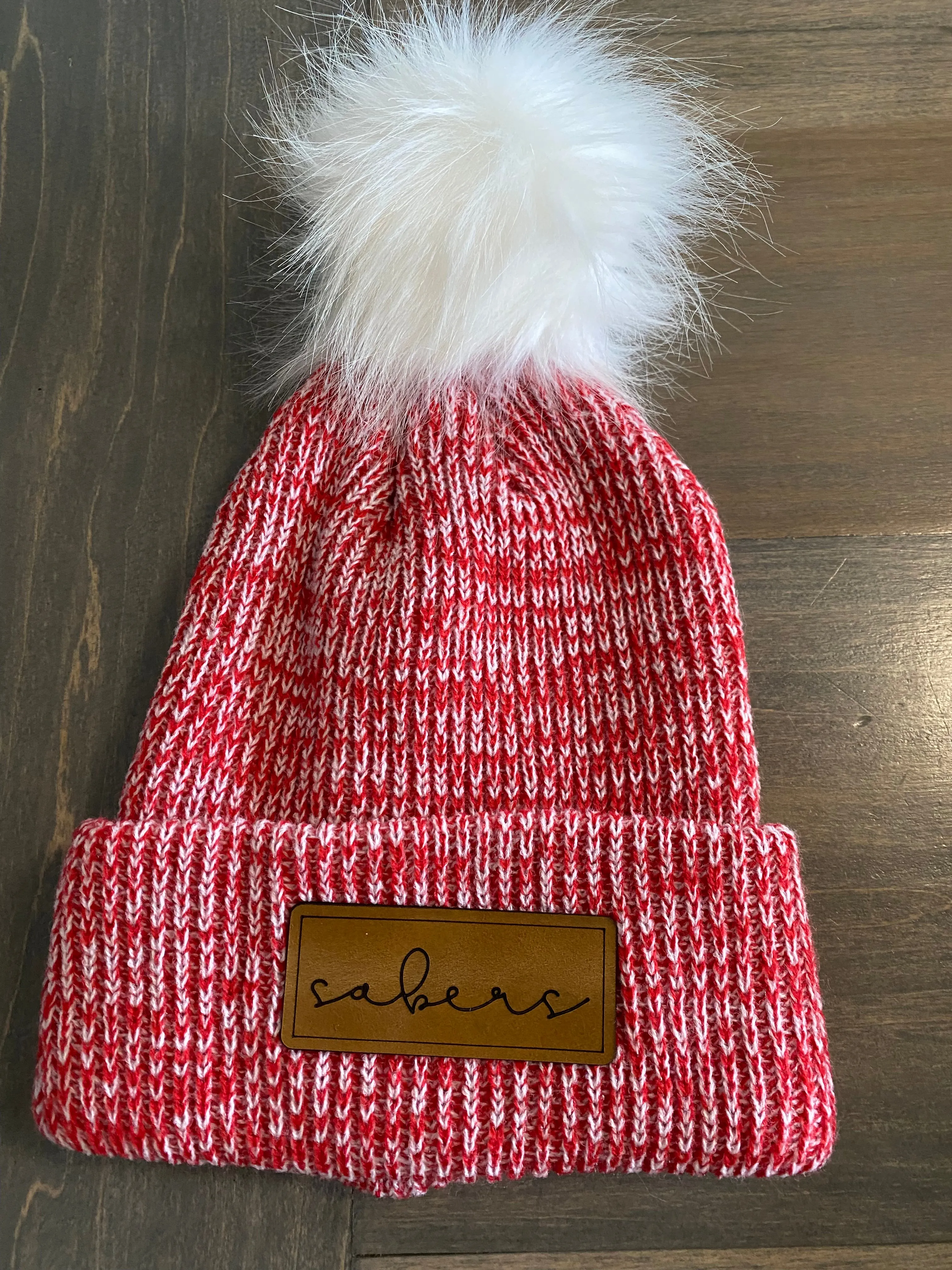 Shakopee pom hats